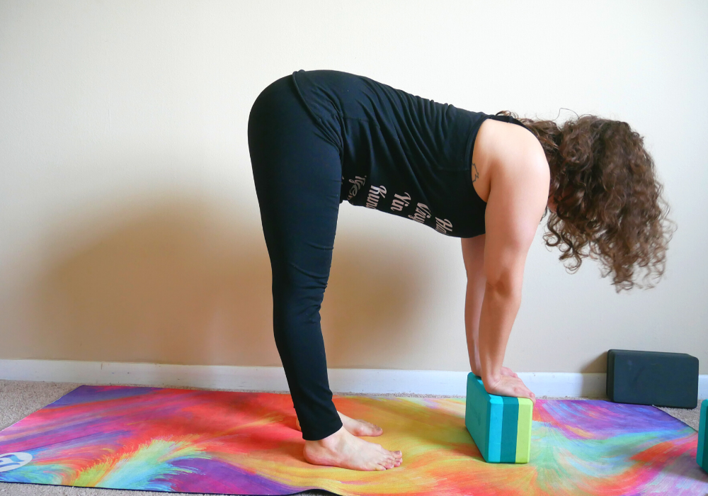 using a yoga block in standing forward fold — Tamara Fayad Yoga